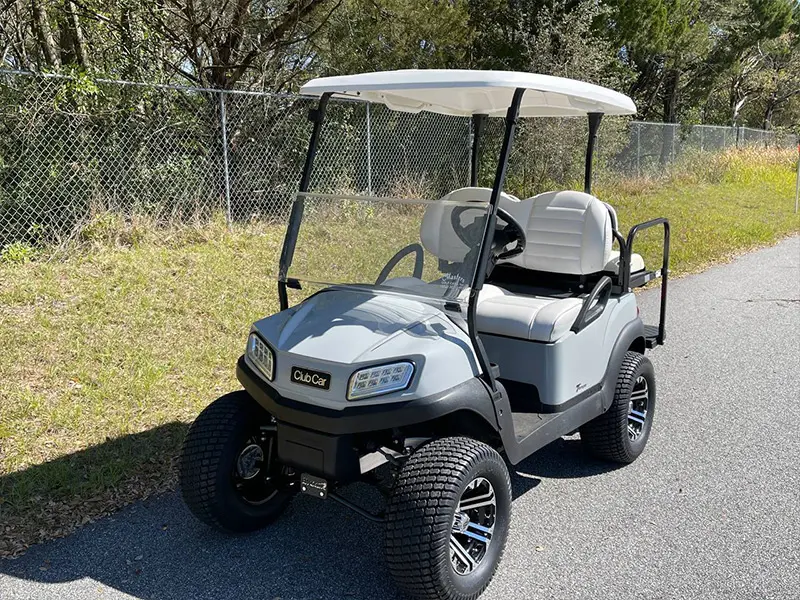 Close-up of golf cart suspension components